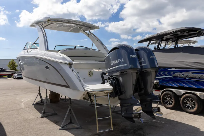Slide: The Image of 2020 Cobalt 30SC Outboard boat with twin Yamaha engines on display. - 9