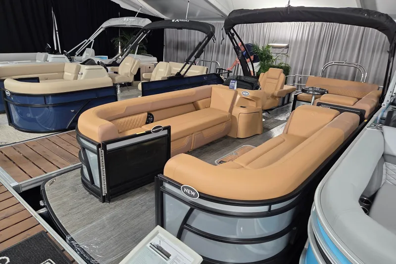 Slide: The Image of 2026 Godfrey SWEETWATER 2486 SFL pontoon boat with luxurious seating and modern design. - 3