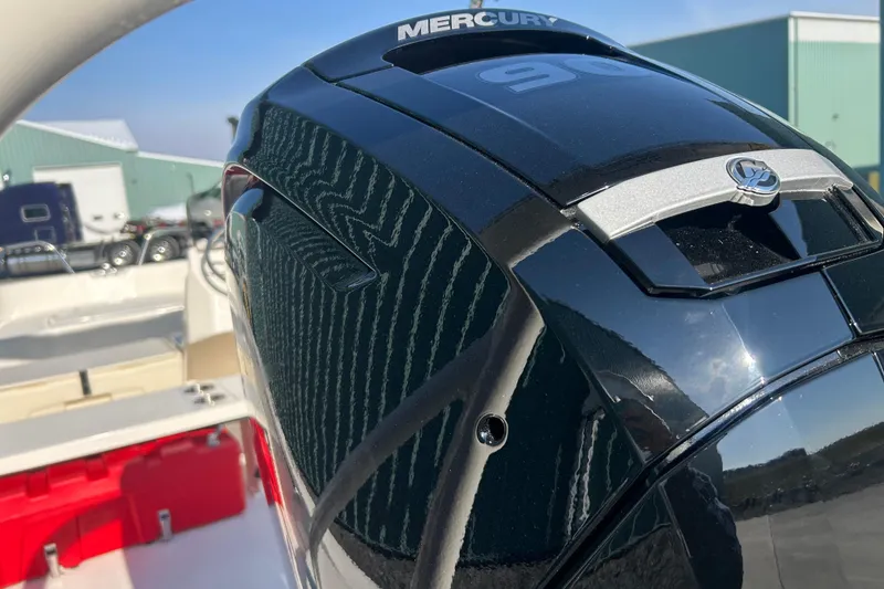 Slide: The Image of 2026 Boston Whaler 160 Super Sport with Mercury engine, close-up view. - 8