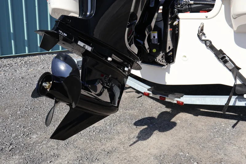Slide: The Image of Outboard motor of 2026 Boston Whaler 160 Super Sport on a trailer. - 9