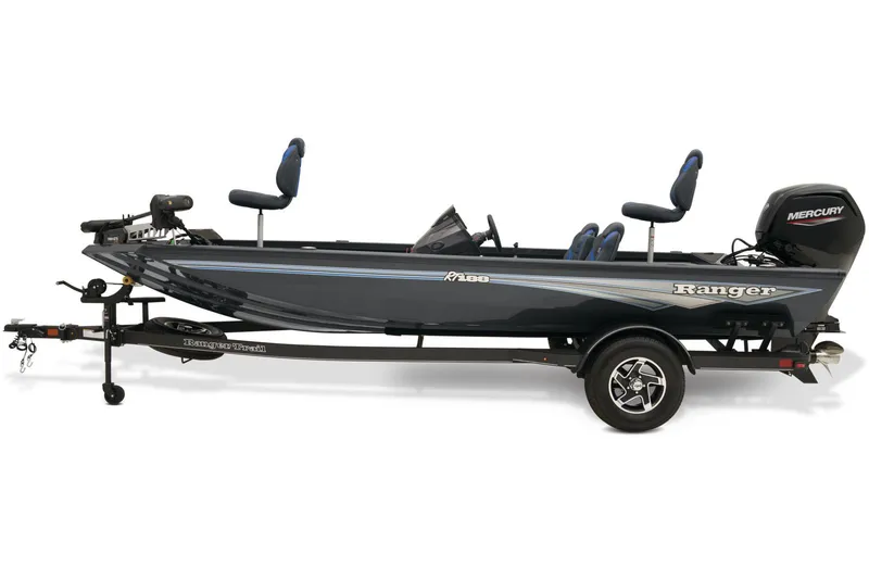 Slide: The Image of 2026 Ranger RT188 fishing boat on trailer, parked outdoors near industrial building. - 6
