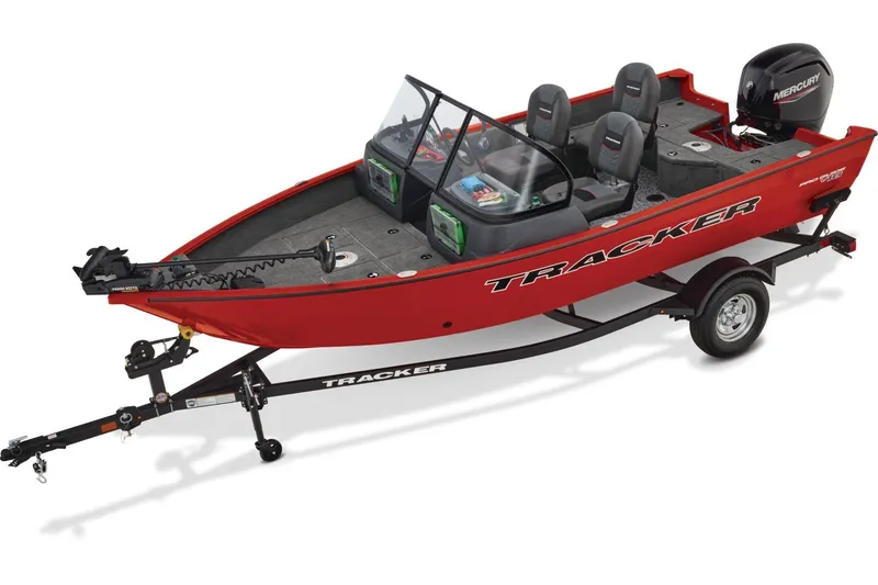 The Image of 2026 Tracker Pro Guide V-16 WT boat on trailer, parked outdoors. - 1