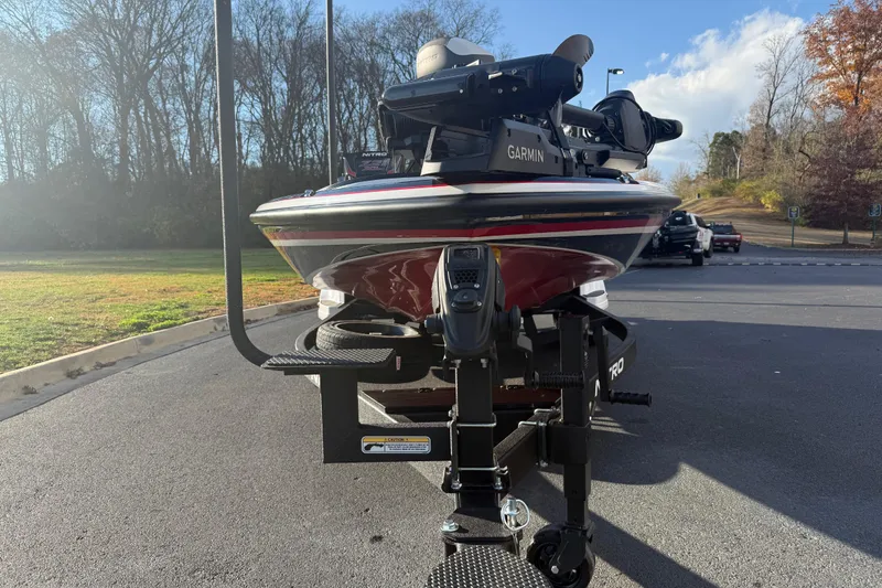 Slide: The Image of 2026 Nitro Z21 XL Pro boat on trailer, parked in sunny outdoor setting. - 84