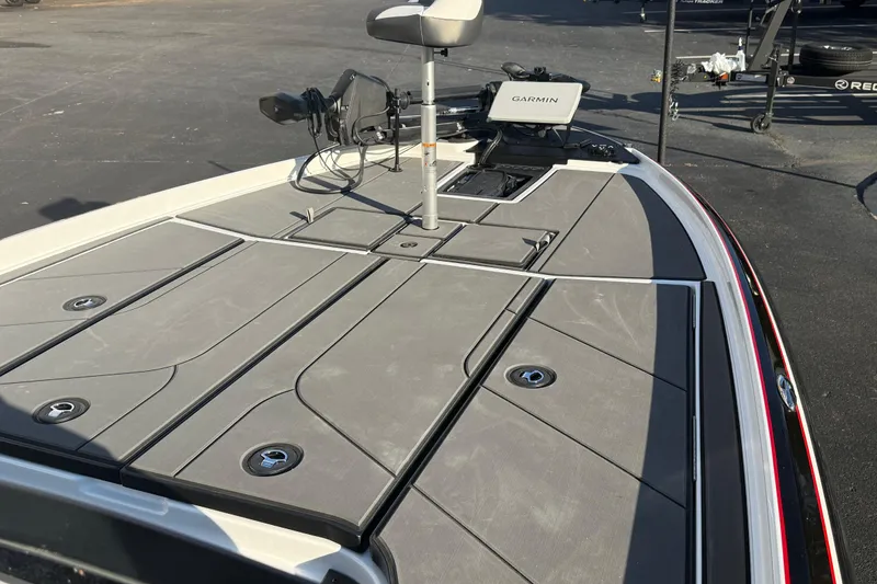 Slide: The Image of 2026 Nitro Z21 XL Pro boat deck with Garmin equipment, featuring sleek design and storage compartments. - 87