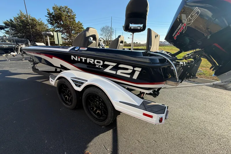 Slide: The Image of 2026 Nitro Z21 XL Pro boat on trailer, featuring sleek design and powerful engine. - 90