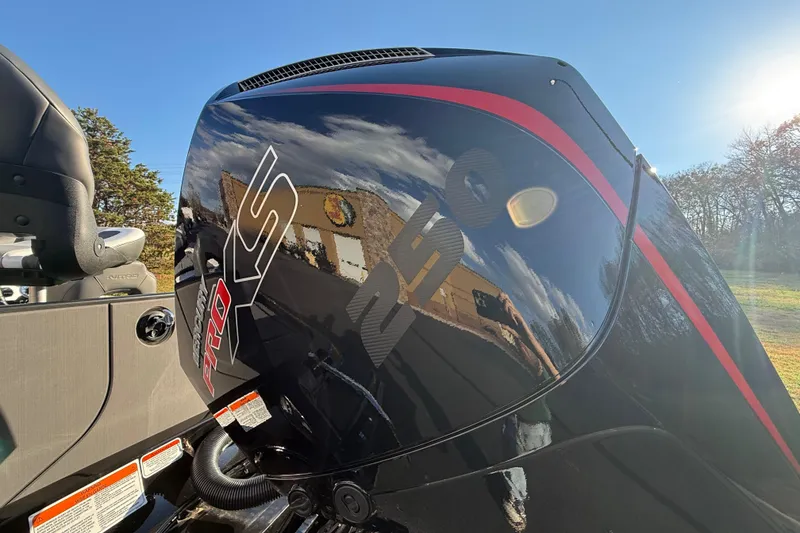 Slide: The Image of 2026 Nitro Z21 XL Pro boat engine with sleek black and red design. - 92