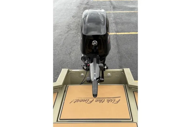 Slide: The Image of 2026 Tracker Grizzly 1756 T Marsh boat with outboard motor, viewed from above. - 11