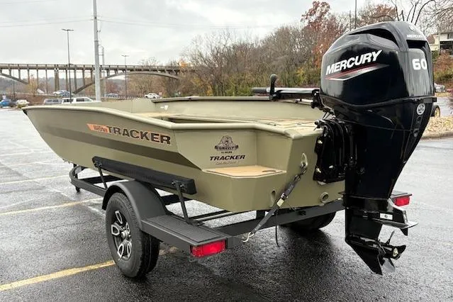 Slide: The Image of 2026 Tracker Grizzly 1756 T Marsh boat with Mercury 60 engine on trailer. - 2