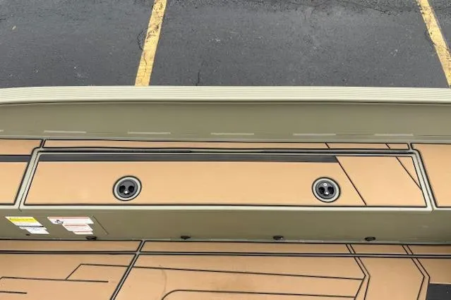 Slide: The Image of 2026 Tracker Grizzly 1756 T Marsh boat deck with storage compartments and non-slip surface. - 28