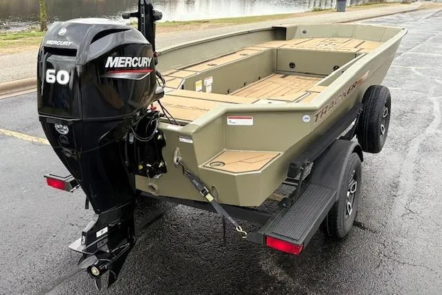 Slide: The Image of 2026 Tracker Grizzly 1756 T Marsh boat with Mercury 60 engine on trailer. - 3