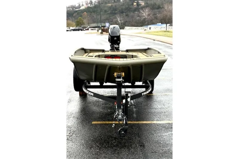 Slide: The Image of 2026 Tracker Grizzly 1756 T Marsh boat on trailer in parking lot. - 39