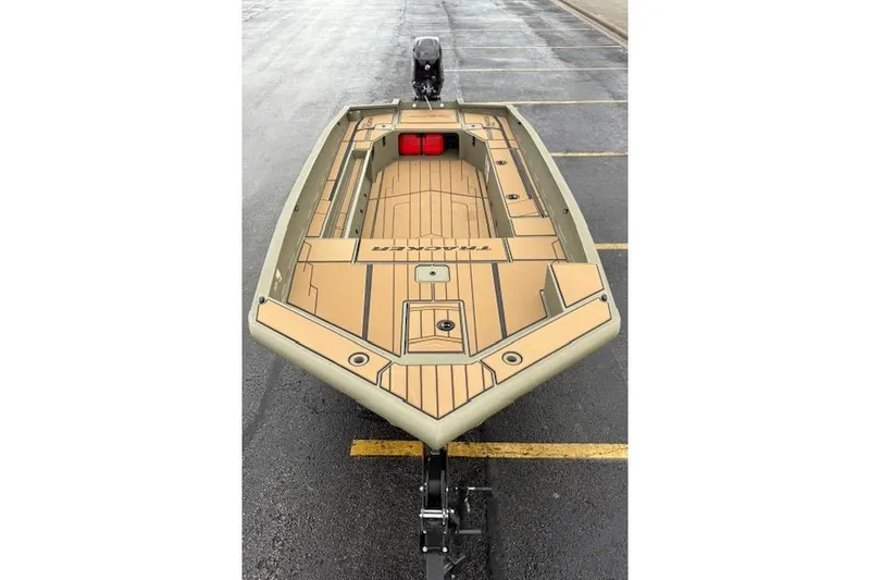 Slide: The Image of 2026 Tracker Grizzly 1756 T Marsh boat on trailer, showcasing spacious deck design. - 6