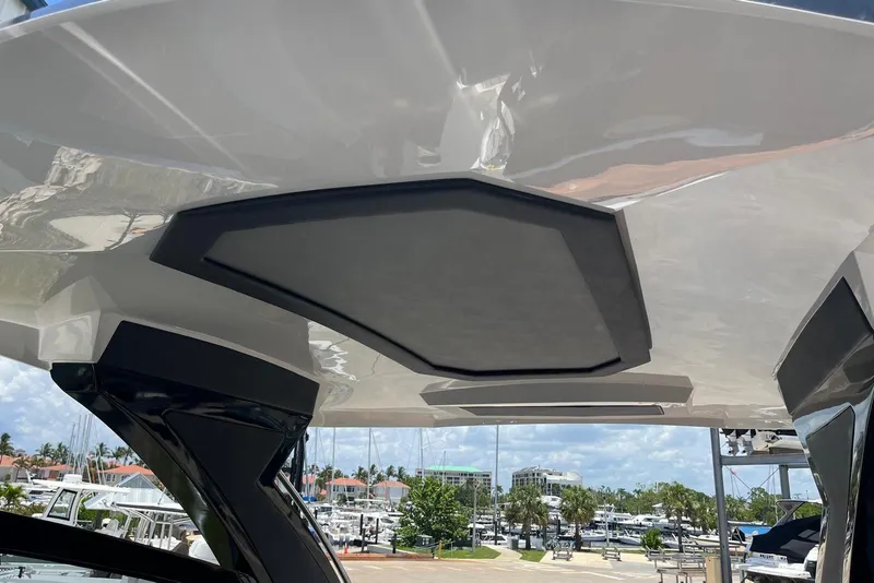 Slide: The Image of 2023 NX Boats NX360 yacht roof detail with marina background. - 19