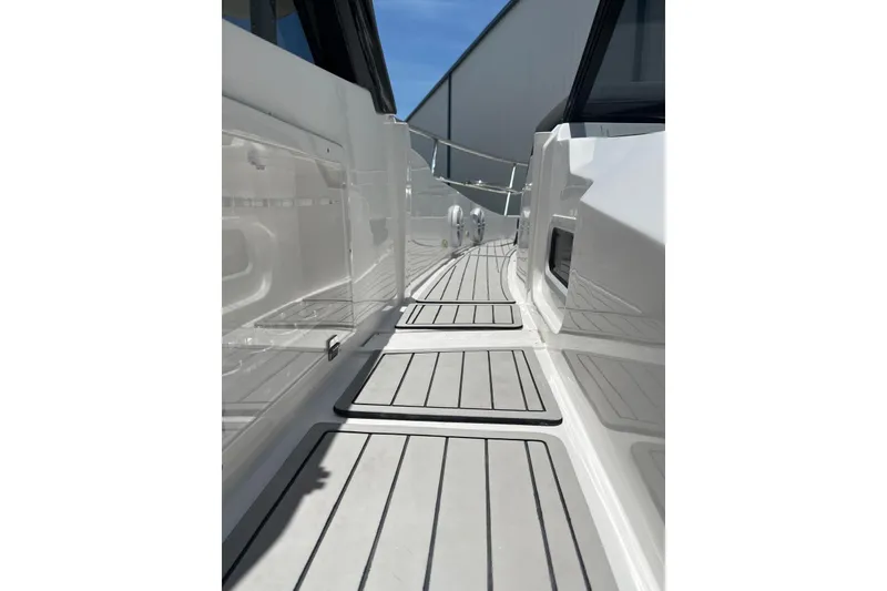 Slide: The Image of Side deck view of 2023 NX Boats NX360, showcasing sleek design and modern features. - 23