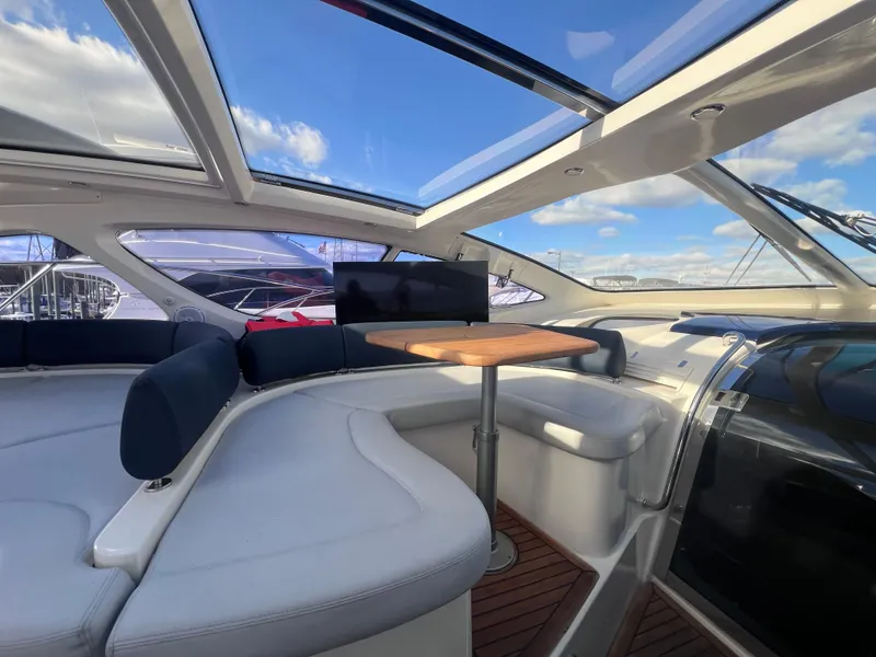 Slide: The Image of Interior of 2006 Azimut Atlantis 55 yacht with skylight and seating area. - 14