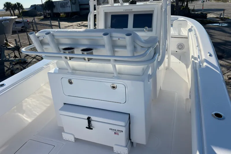 Slide: The Image of 2026 Contender 28 Tournament boat interior with seating and storage compartments. - 10