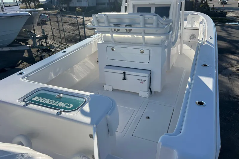 Slide: The Image of 2026 Contender 28 Tournament boat interior with seating and storage compartments. - 7
