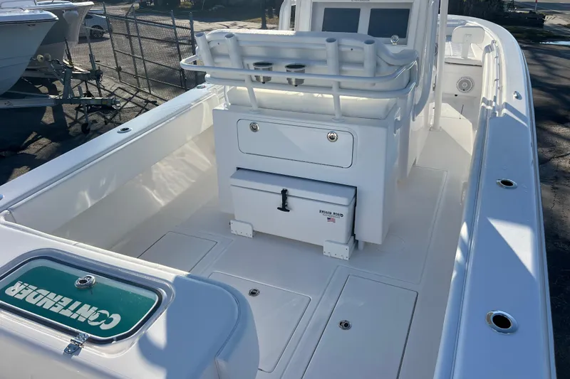 Slide: The Image of 2026 Contender 28 Tournament boat interior with seating and storage compartments. - 8