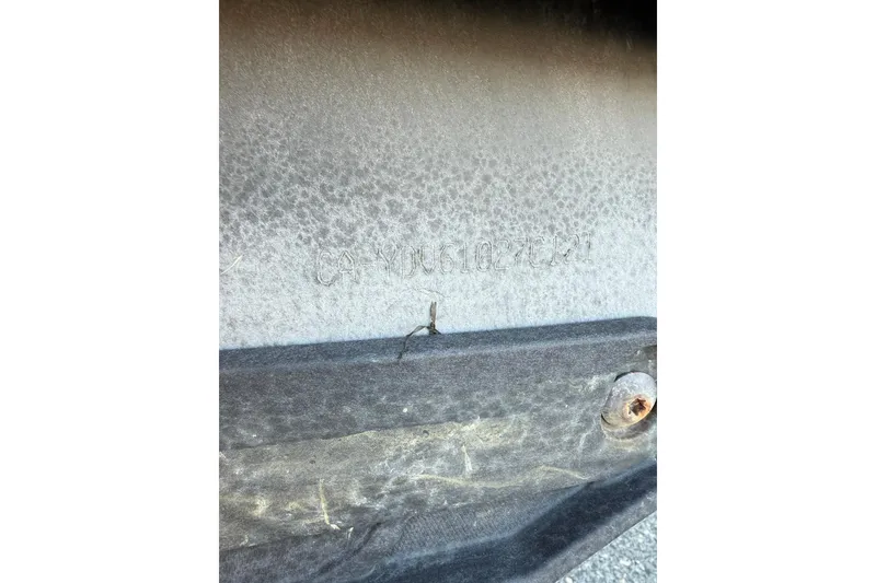 Slide: The Image of 2021 Sea-Doo Spark Trixx 2up hull with visible serial number engraving. - 11