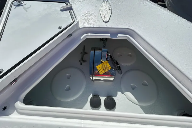 Slide: The Image of Open storage compartment on 2026 Contender 35 ST boat, showcasing interior features. - 21