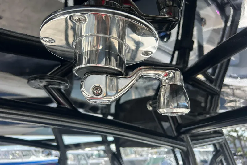 Slide: The Image of Close-up of a chrome fixture on a 2026 Contender 35 ST boat. - 26