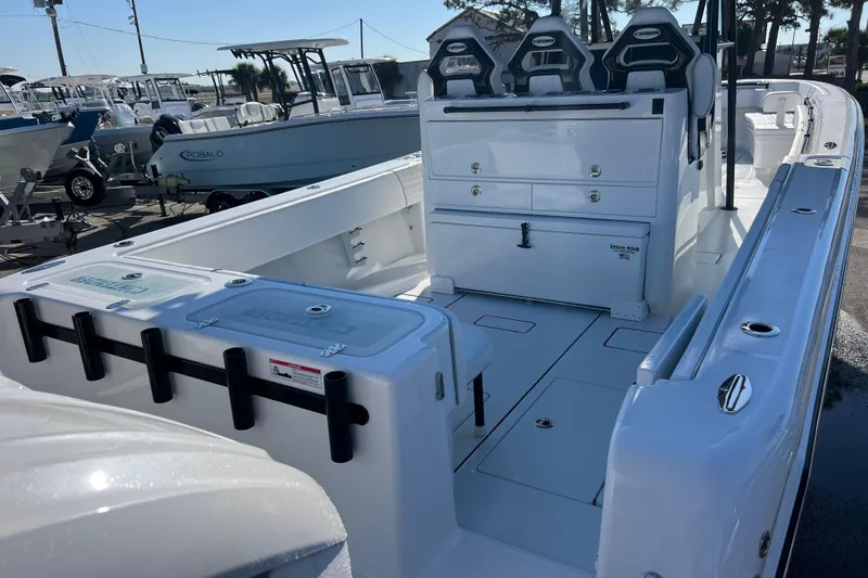 Slide: The Image of 2026 Contender 35 ST boat interior with seating and storage compartments. - 5
