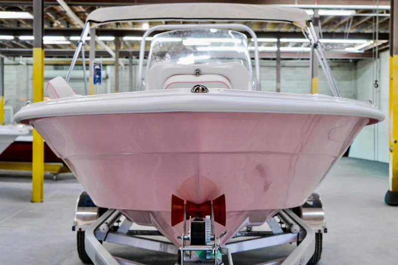 Slide: The Image of 2026 ALK2 Powerboats 18 CRS in a showroom, front view. - 2