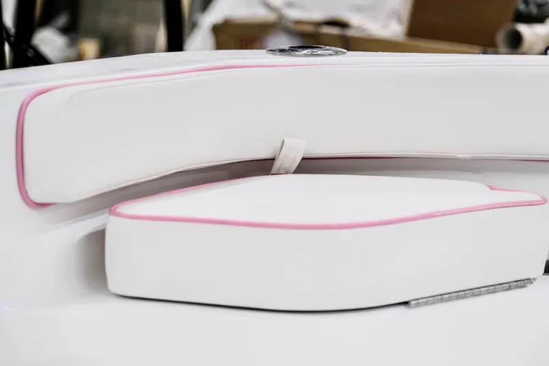 Slide: The Image of White and pink cushioned seating on 2026 ALK2 Powerboats 18 CRS. - 3