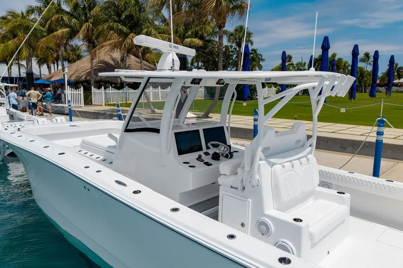 Slide: The Image of 2026 Front Runner 35 Catamaran docked, showcasing sleek design and modern features. - 7