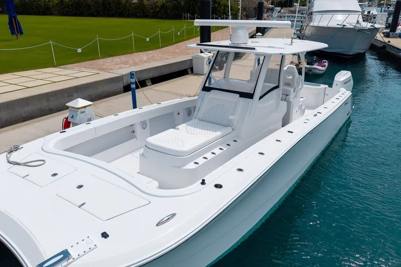 The Image of 2026 Front Runner 35 Catamaran docked in marina, showcasing sleek design and spacious deck. - 0