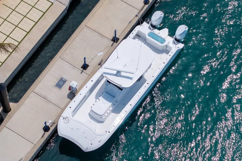 Slide: The Image of Aerial view of 2026 Front Runner 35 Catamaran docked by the water. - 1