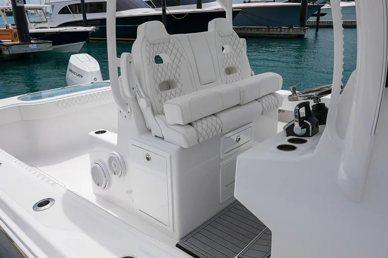 Slide: The Image of Luxurious interior of 2026 Front Runner 35 Catamaran with plush seating and modern controls. - 11