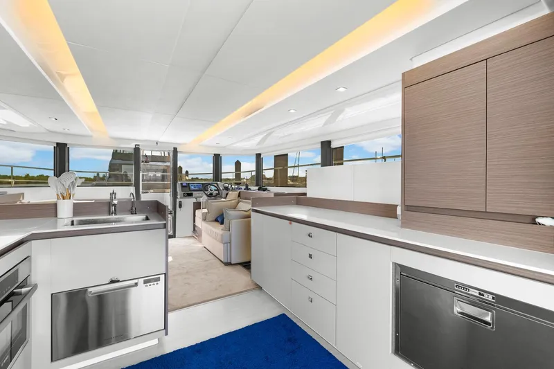Slide: The Image of Luxurious interior of 2024 Leopard 46 Powercat yacht with modern kitchen and helm station. - 3