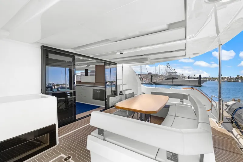 Slide: The Image of 2024 Leopard 46 Powercat yacht with spacious deck and modern interior at marina. - 39