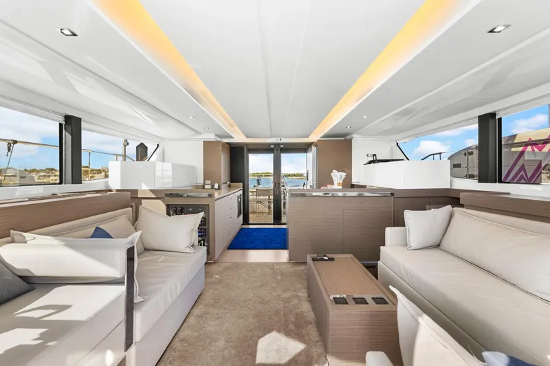 Slide: The Image of Luxurious interior of 2024 Leopard 46 Powercat yacht with modern furnishings and panoramic windows. - 47