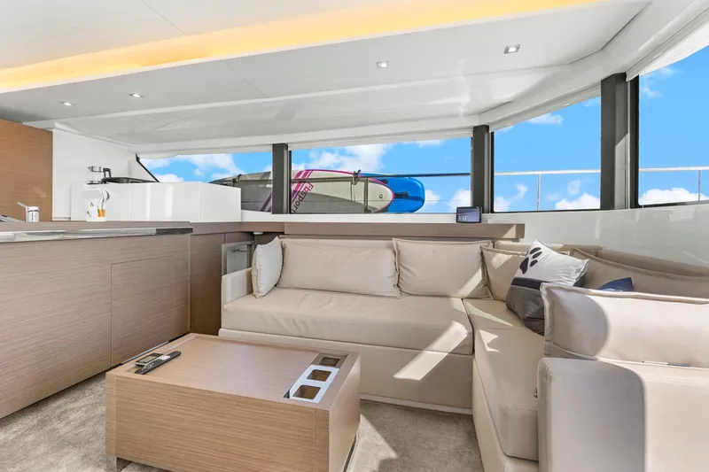 Slide: The Image of Luxurious interior of 2024 Leopard 46 Powercat yacht with modern seating and panoramic windows. - 50