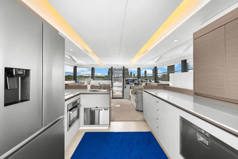 Slide: The Image of Luxurious interior of 2024 Leopard 46 Powercat yacht with modern kitchen and sleek design. - 52