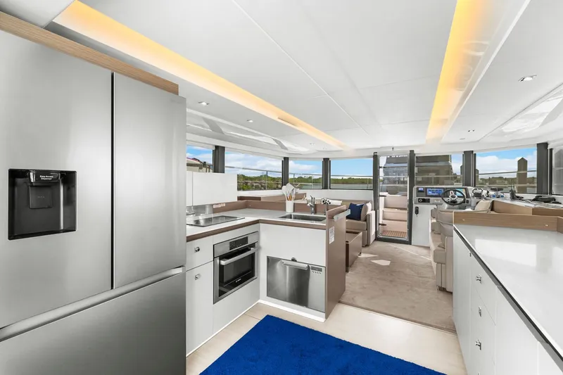Slide: The Image of Luxurious interior of 2024 Leopard 46 Powercat yacht with modern kitchen and spacious seating. - 53