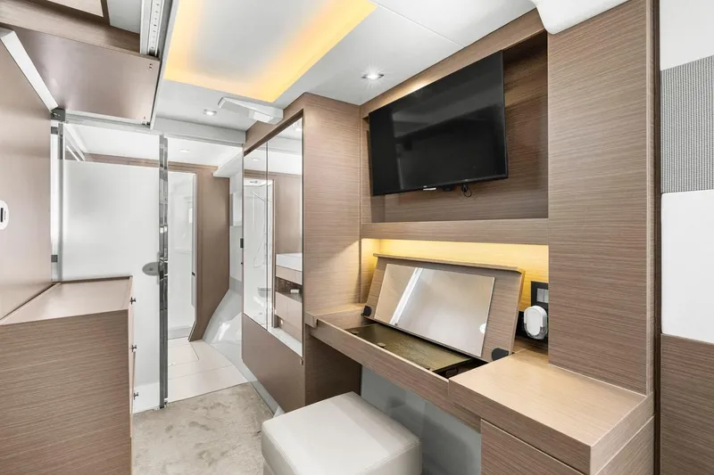 Slide: The Image of Luxurious interior of 2024 Leopard 46 Powercat with modern wood finish and TV. - 56