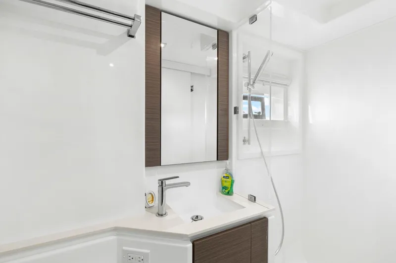 Slide: The Image of Modern bathroom in 2024 Leopard 46 Powercat yacht with sleek fixtures and mirror. - 67