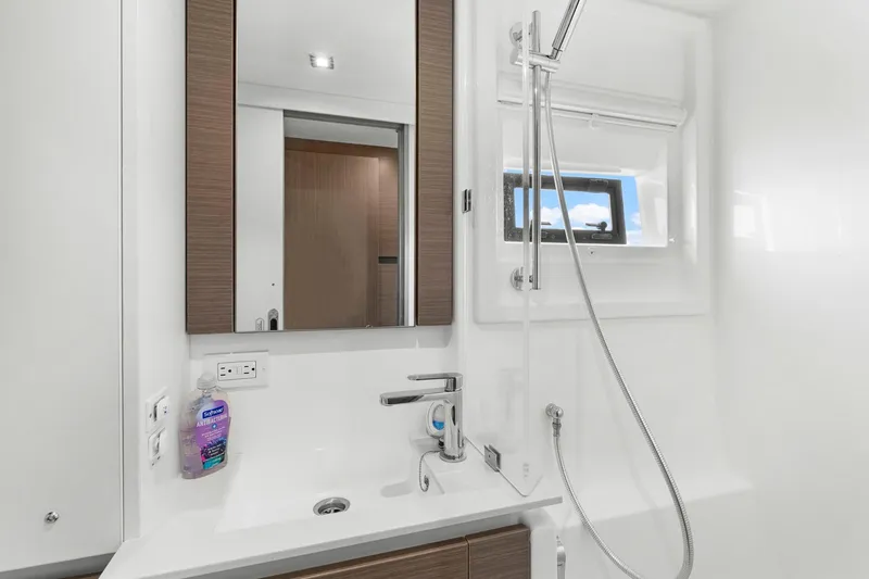 Slide: The Image of Modern bathroom in 2024 Leopard 46 Powercat yacht with sleek fixtures and window. - 68