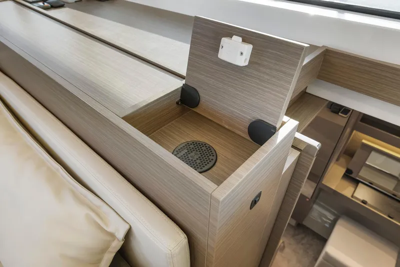 Slide: The Image of Interior detail of 2024 Leopard 46 Powercat yacht, featuring modern wood finish and built-in speaker. - 73