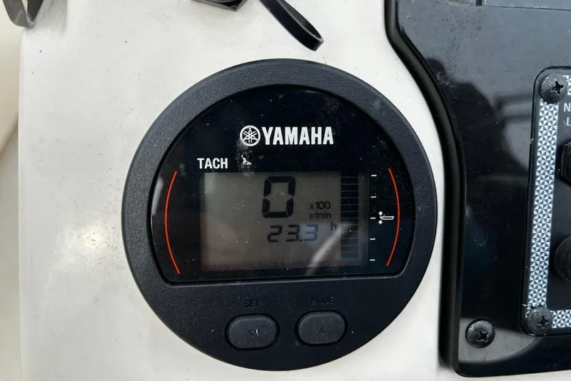 Slide: The Image of Yamaha tachometer on 2022 Scout 195 Sport Dorado boat dashboard. - 13