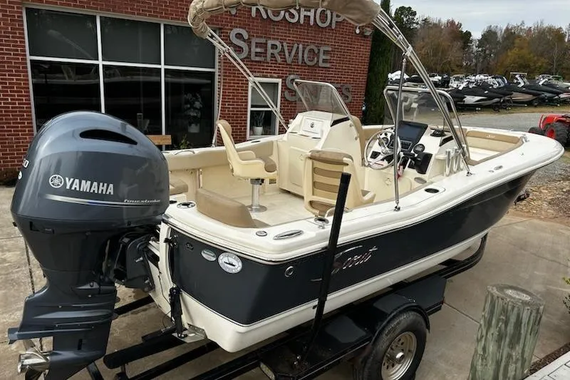 Slide: The Image of 2022 Scout 195 Sport Dorado boat with Yamaha engine on trailer. - 3