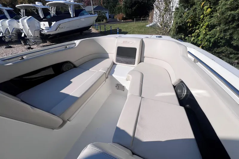Slide: The Image of 2020 Boston Whaler 230 Vantage boat interior with spacious seating and modern design. - 28