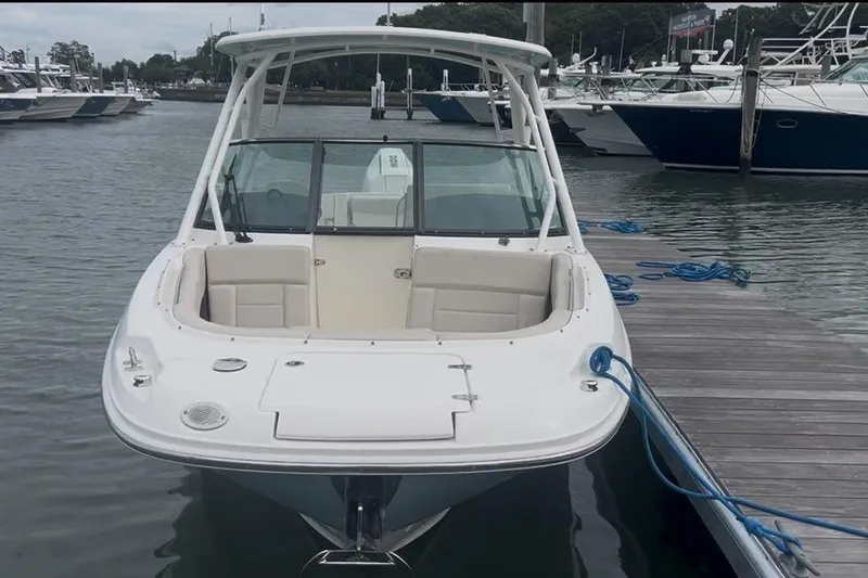 Slide: The Image of 2020 Boston Whaler 230 Vantage docked at marina, front view. - 29