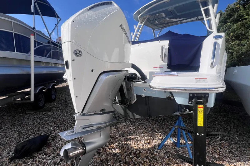 Slide: The Image of 2020 Boston Whaler 230 Vantage with Mercury outboard engine on display. - 6
