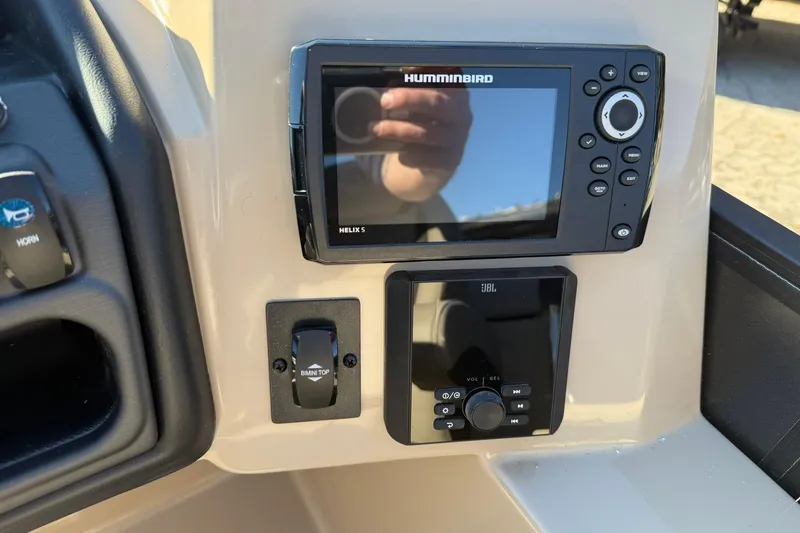 Slide: The Image of Control panel of 2026 Bentley Pontoons Legacy 223 Navigator with Humminbird Helix 5 display. - 10