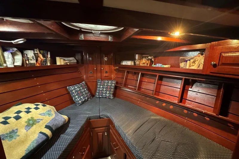 Slide: The Image of Cozy 1987 Custom Cedar Craft boat cabin with wooden interior and nautical decor. - 29