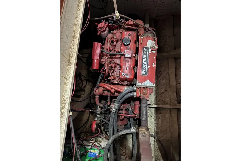Slide: The Image of Red Westerbeke engine in a 1987 Custom Cedar Craft boat. - 33